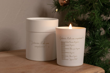 La bougie blanche parfumée "Atmosphère de Noël"